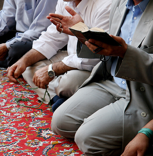 People praying on their knees